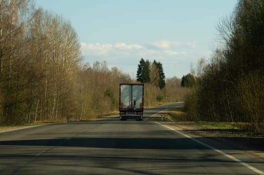 Car driving on a highway. auto moving on a roadway background