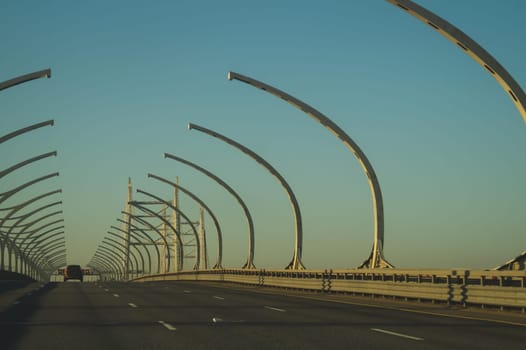 Car driving on a highway. auto moving on a roadway background