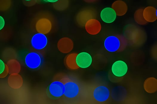 Abstract colorful bokeh defocused lights. holiday background