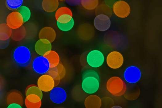 Abstract colorful bokeh defocused lights. holiday background