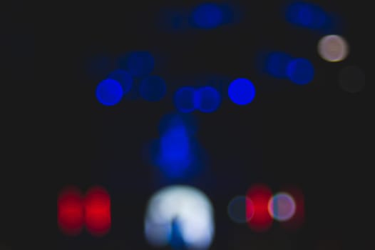 Abstract colorful bokeh defocused lights. holiday background