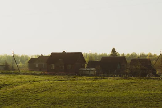 Countryside view with village house. houses in the filed