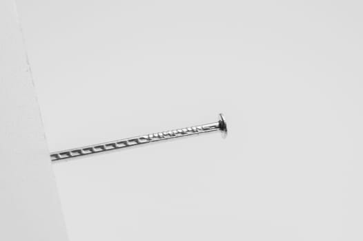 Metal nail isolated on white