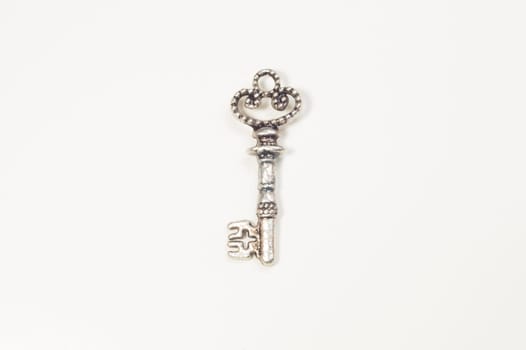 Vintage key isolated on white background. safety and security concept