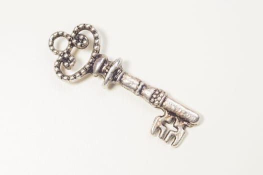 Vintage key isolated on white background. safety and security concept