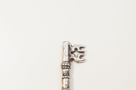 Vintage key isolated on white background. safety and security concept