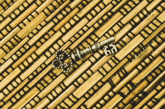 Vintage key on the wooden background. safety and security concept