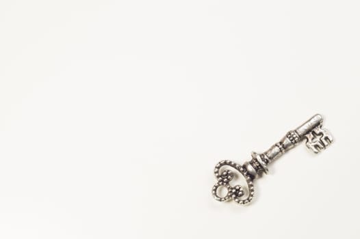 Vintage key isolated on white background. safety and security concept