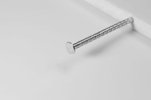 Metal nail isolated on white