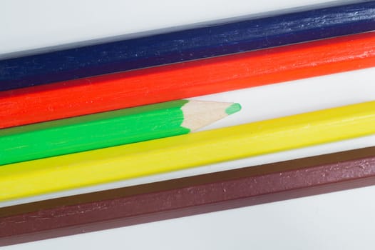 Colorful pencils isolated on white. drawing supplies