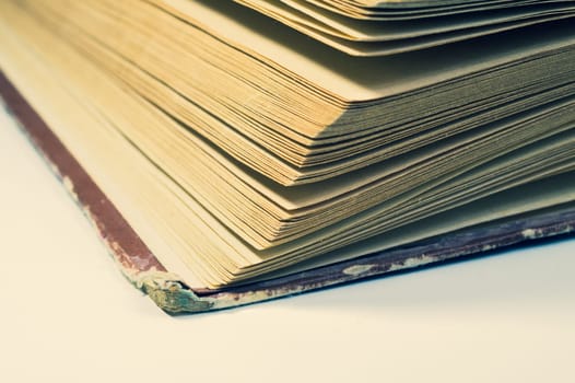 Detail of the book isolated on white background. lines of the book pages
