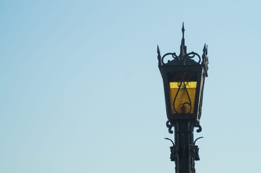 Vintage street lamp against the sky. Retro lantern. copy space