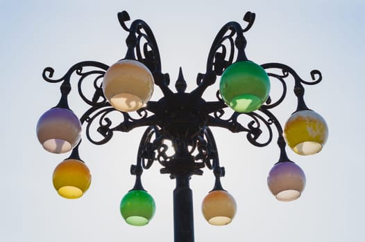 Vintage colorful street lamp against the sky. Retro lantern