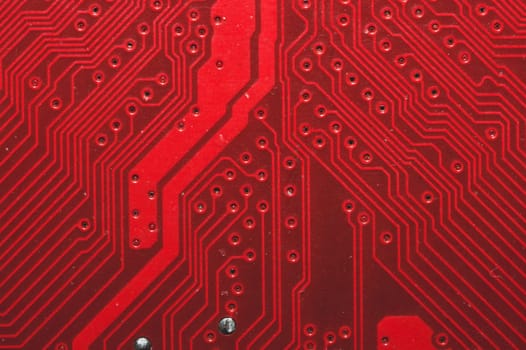 Spoiled motherboard close up. circuit board with dust and defects. modern technologies. micro elements of computer with connections and traces. Intelligent technology abstract background