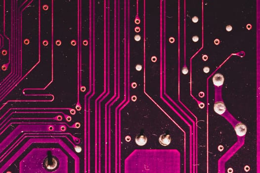 Spoiled motherboard close up. circuit board with dust and defects. modern technologies. micro elements of computer with connections and traces. Intelligent technology abstract background