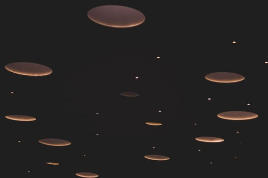 Sparkling lights on a black background. abstract backdrop with blinking lights
