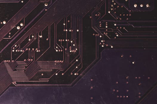 Spoiled motherboard close up. circuit board with dust and defects. modern technologies. micro elements of computer with connections and traces. Intelligent technology abstract background