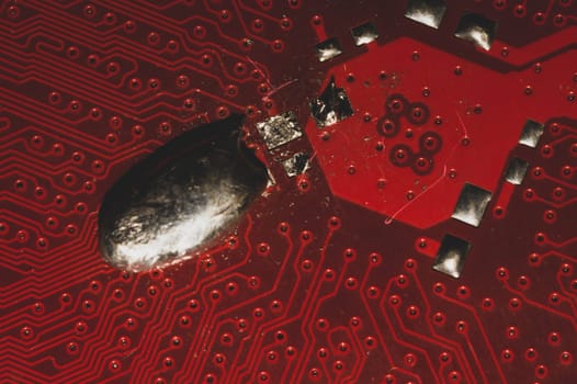 Spoiled motherboard close up. circuit board with dust and defects. modern technologies. micro elements of computer with connections and traces. Intelligent technology abstract background