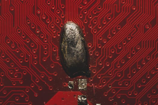 Spoiled motherboard close up. circuit board with dust and defects. modern technologies. micro elements of computer with connections and traces. Intelligent technology abstract background