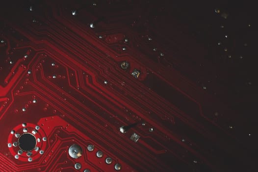 Dusty motherboard close up. circuit board with dust and defects. modern technologies. micro elements of computer with connections and traces. Intelligent technology abstract background
