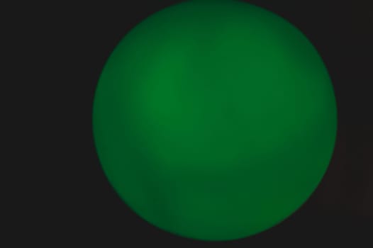 Glowing sphere in the dark. round template with color backlit