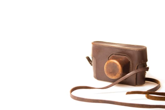 Old camera in brown leather case