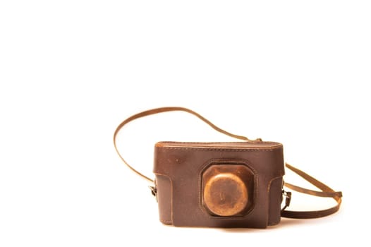 Old camera in brown leather case