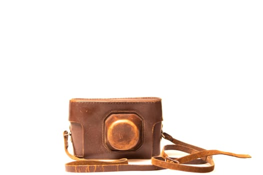 Old camera in brown leather case