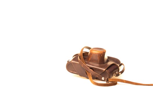 Old camera in brown leather case
