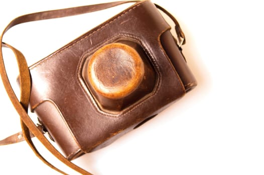 Old camera in brown leather case