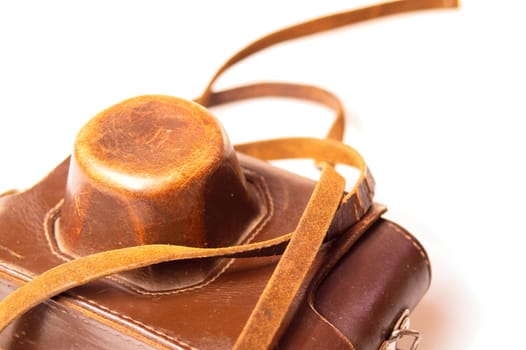 Old camera in brown leather case