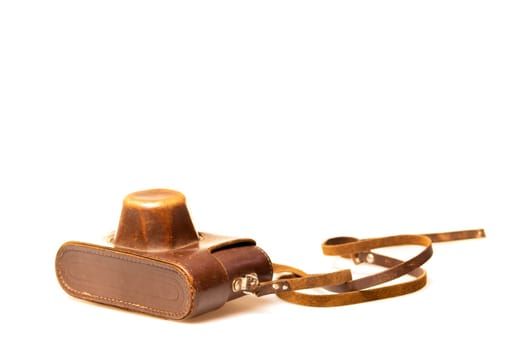 Old camera in brown leather case