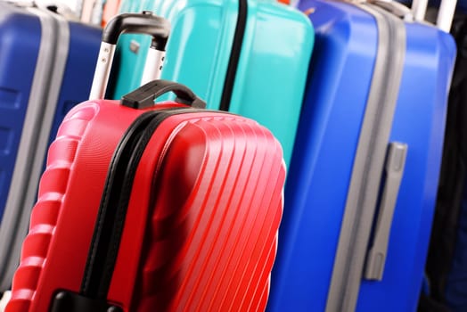 Composition with colorful travel suitcases.