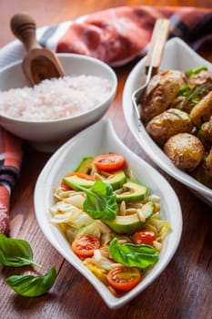 Low calorie cabbage salad with avocado and oven potatoes