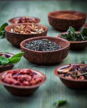 Assortment of dry tea in bowls