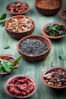 Assortment of dry tea in bowls