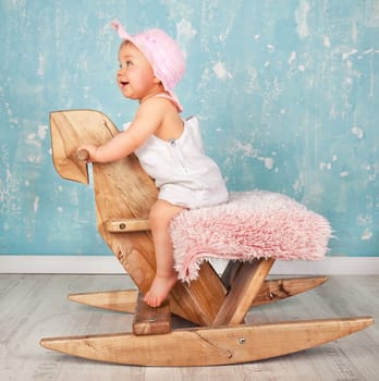 Toddler on rocking horse