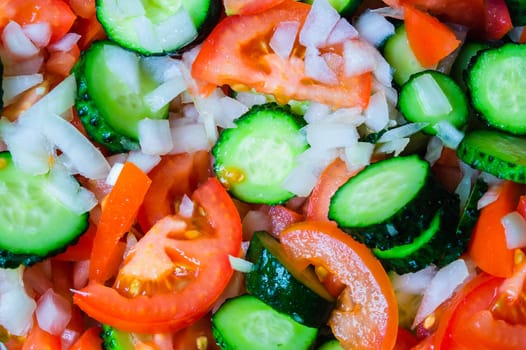 Tomato and cucumber salad. fresh chopped vegetables. healthy vegetarian organic food