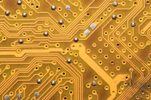 Burnt circuit board abstract background. spoiled motherboard close up. micro elements of computer. Intelligent technology