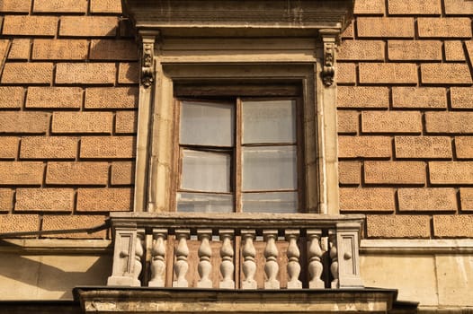 Brown brick wall with decorated windows background