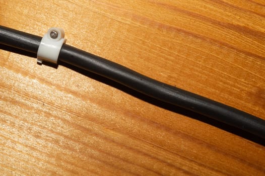Old wood background. wooden texture with a cable