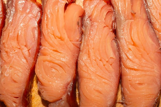 Red fish pieces. smoked salmon. seafood close up