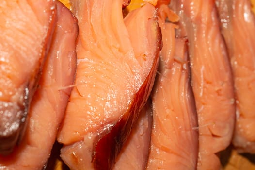Red fish pieces. smoked salmon. seafood close up