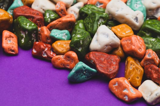 Candy pebbles. sweets in the form of colored stones. colorful candies background