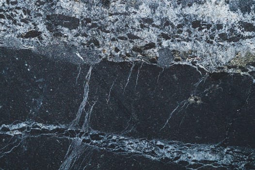 Carbon stone gray texture. flat scratched surface. geological background