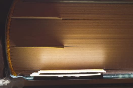 Old book edge. book with bookmarks