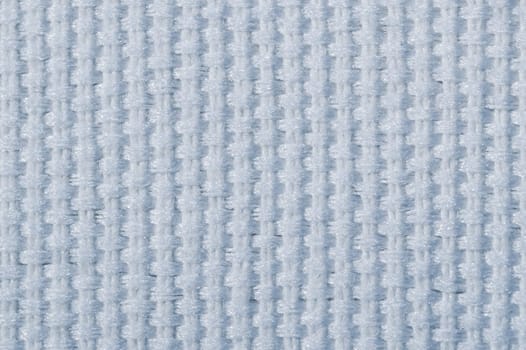 Knitted fabric macro. woven material background. textile texture close up