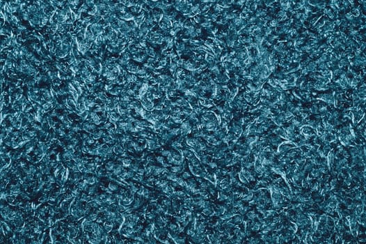 Soft fabric texture. turquoise extile with curly fibers. wool background close up