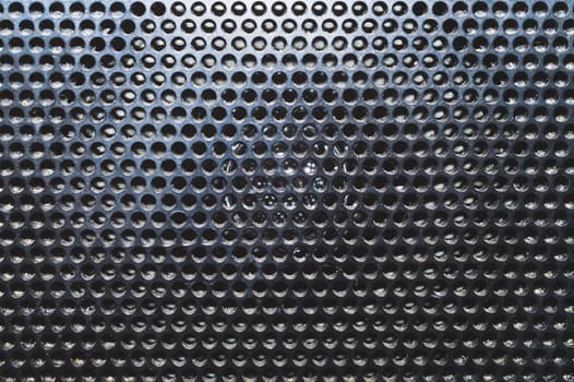 Grid pattern surface. dusty speaker mesh texture close up. perforated plastic. abstract background
