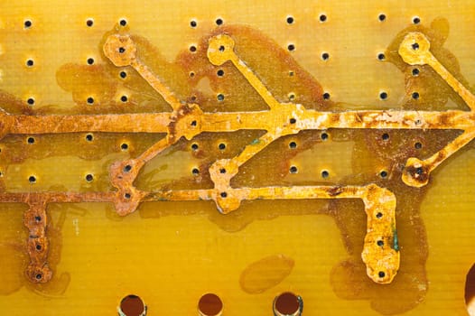 Handmade circuit board with copper tracks. industrial background. radio engineering background. textolite with soldering